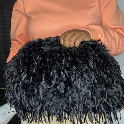 The Shag Oversized Clutch Bag 🥴