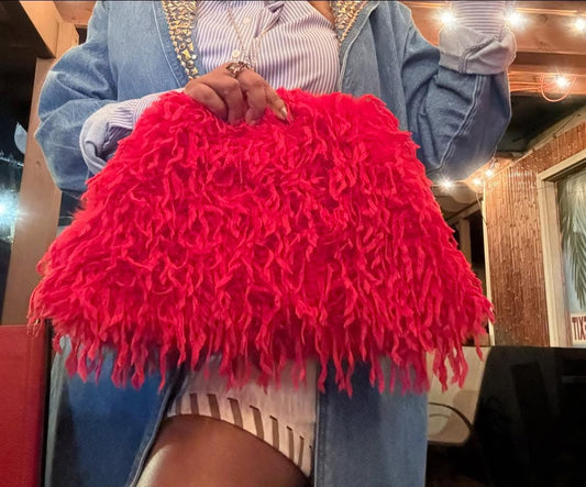 The Shag Oversized Clutch Bag 🥴